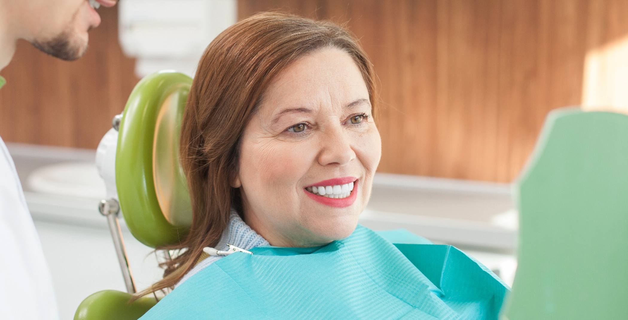 Woman smiling in the dental chair