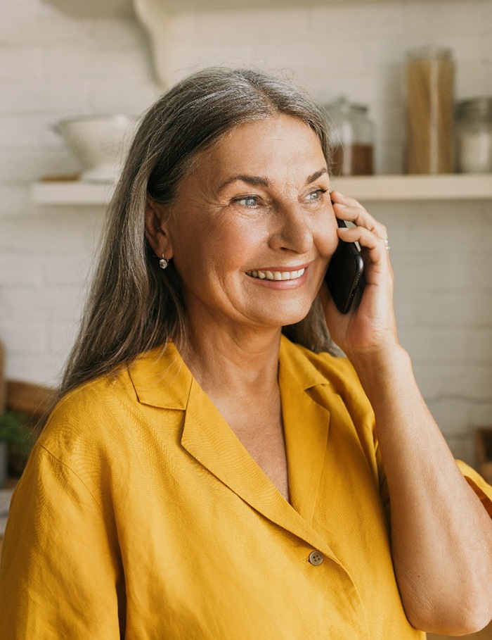 Woman smiling in the dental chair
