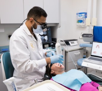 Dr. Al treating a patient