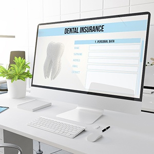 Dental insurance form on large computer monitor