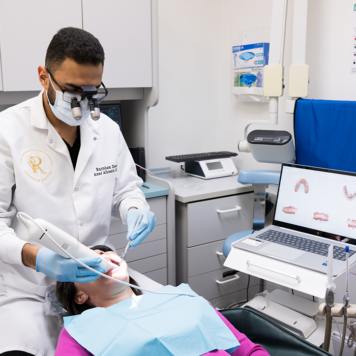 Dentist scanning patient's mouth