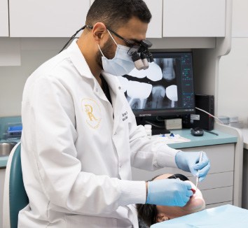 photo of Dr. Baseri With Patient