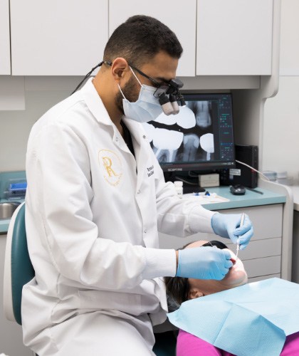 photo of Dr. Baseri With Patient