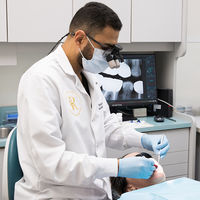 Dentist performing preventive dentistry in Raynham