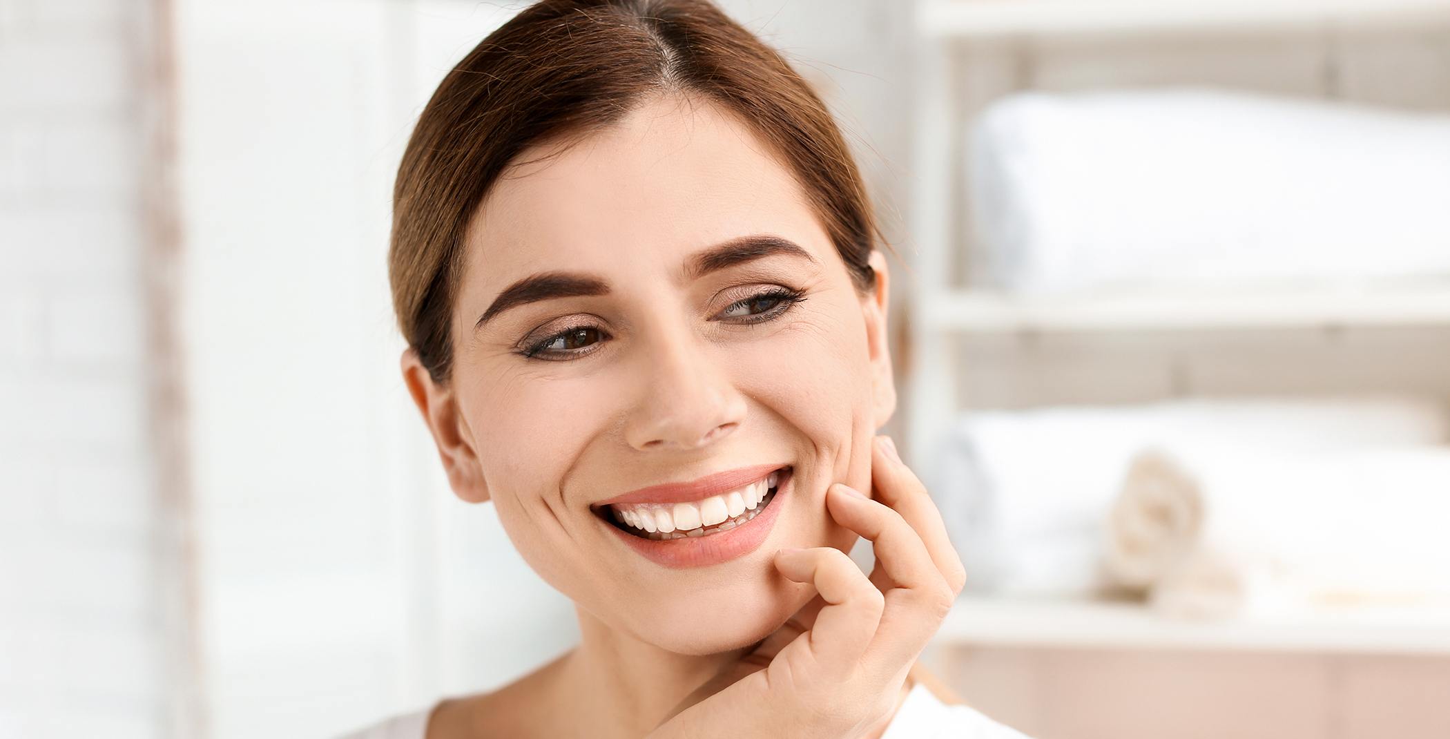Patient in Raynham smiling after Zoom teeth whitening treatment 